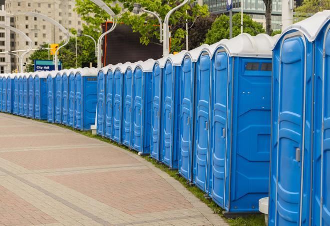 a row of portable restrooms set up for a special event, providing guests with a comfortable and sanitary option in Ambridge, PA